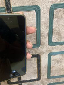 I Phone 5c With Cover and Earphones
