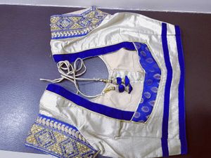 Half net saree with stiched blouse and peticoat