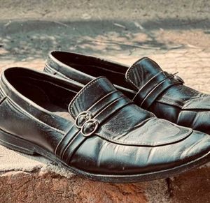 2 Pair Of Shoes