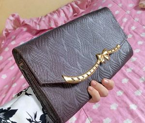 Vintage Bow Accent Clutch