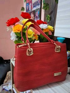 Stylish textured red handbag for women