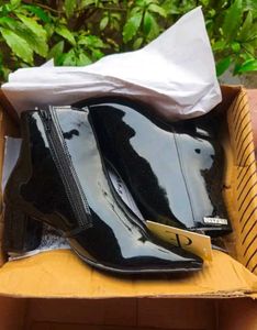 women black heeled Chelsea boots