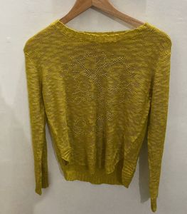 yellow sweater