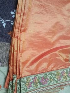 Elegant Unstitched Golden Blouse &amp; Orange Saree