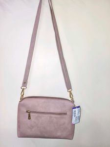 Pink Mochi Sling Bag With Quilted Front And Solid
