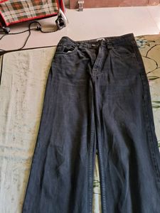 A Mixture Of Greyish Balckish Jeans