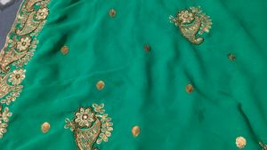Elegant rama colour Embroidered Saree