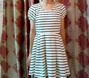 White Dress With a Bow in Back.