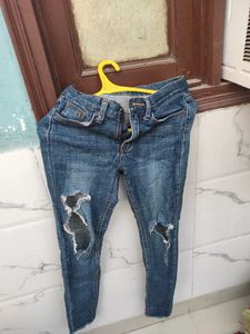 Ripped Knee Denim Jeans