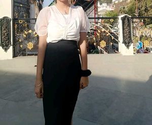 Black Skirt With A Slit