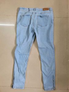 Ripped Light Wash Denim Jeans