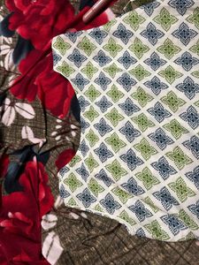 both Patterned Sleeveless Top and long kurti