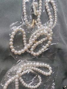 Channel Pearl Necklaces