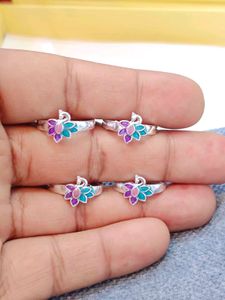 Pure silver toe ring in peacock design.