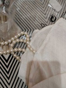 Bodycon Mini pearl sleeve dress 🤍🪽