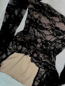 black lace top with skin shirt underneath