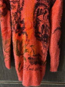 Fuzzy Orange Graphic Sweater