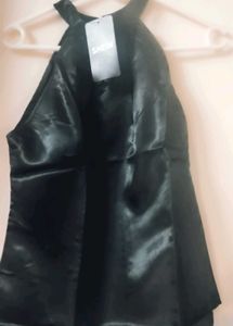 She in Elegant Black Halter Top