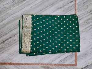 Green Saree with Gold Accents