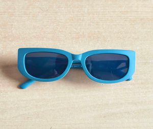 Teal Retro Sunglasses