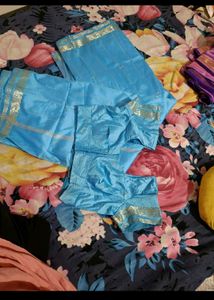 Woman Silk saree with stitched blouse