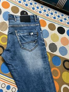 Ripped Wash Jeans
