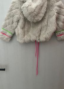 white fur jacket