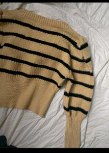 Its a Honeycomb Sweater With Yellow Black Straps