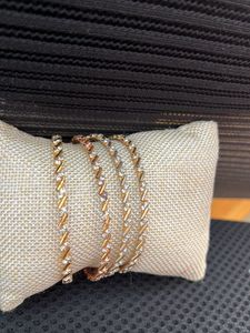 diamond studd Gold Tone Bangle size 2’4