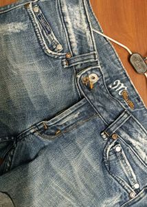 Ripped Denim Shorts