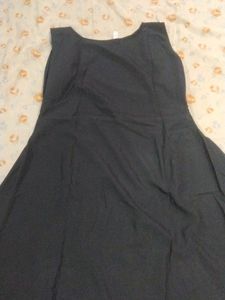 Long Black Gown With Some Design On Neck