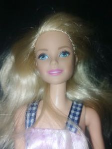 Blonde Barbie Doll in Pink Dress