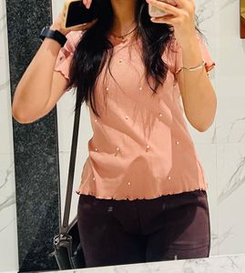Pink Pearl Embellished Ruffle Tee