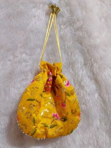 Yellow And Pink Potli Embroidery Design