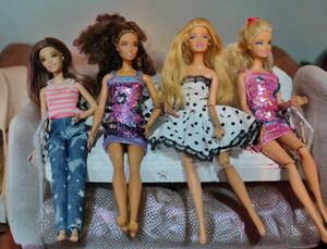 Four Barbie Dolls Bundle