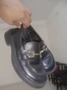 Black Loafers with Gold Detail