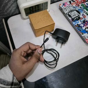 Small Pin Mobile Charger.