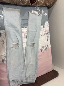Distressed Light Wash Denim Jeans