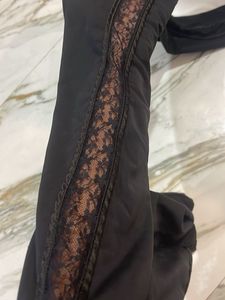 Black Leggings ( With Lace Work On Both Sides)