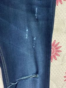 Ripped / Distressed Navy Blue Jeans