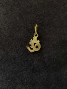 Gold "Om" Pendant