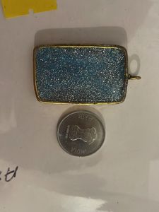 Sparkly blue resin pendant