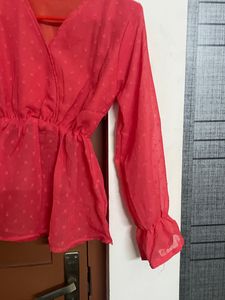 Coral Peplum Top