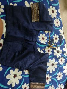 Blue Saree With Golden Line...