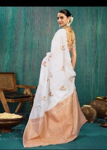 Elegant Silk white and gold saree