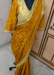 Elegant Mustard Saree with Gold Border