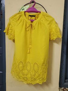 Yellow Color Cut Work Top