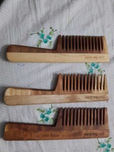 A Set Of 3 Neem Wood Comb