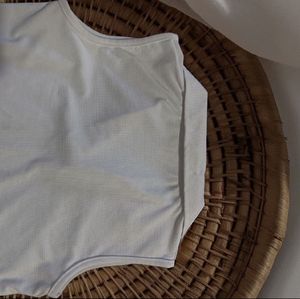 White Sleeveless Polo Top