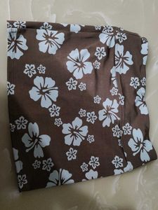 A beautiful brown miniskirt skirt with blue floral